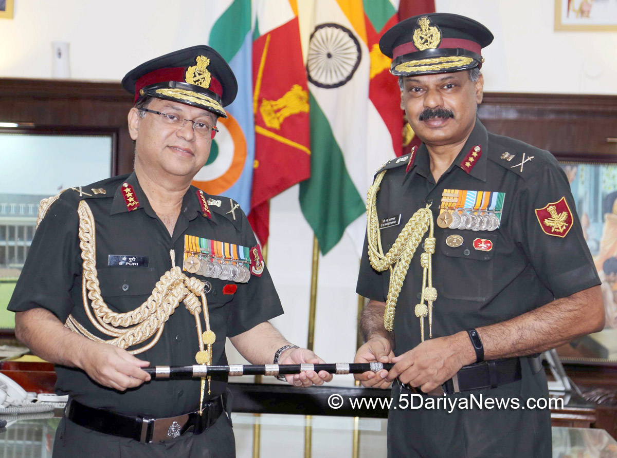 The Director General Armed Forces Medical Services (DGAFMS), Lt. Gen. Bipin Puri receiving the ‘Baton’ from the outgoing Senior Colonel Commandant, Lt. Gen. C.S. Narayanan, on the occasion of his taking over as Senior Col. Commandant of the Army Medical Corps, in New Delhi on April 26, 2018.