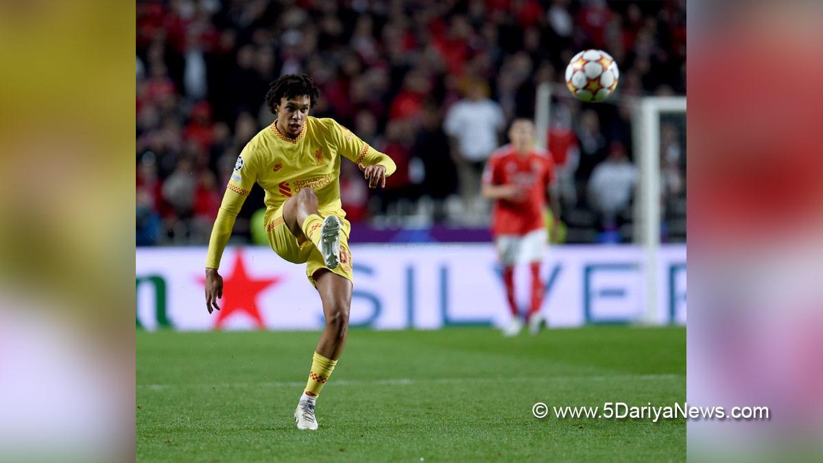 UEFA Champions League: Liverpool thrash Benfica; City overcome Atletico 1-0  Lisbon  Premier League giants Liverpool have one foot in the UEFA Champions League semifinal after they defeated Portuguese club Benfica 3-1 in the quarterfinal first leg at Estadio da Luz here on Wednesday (IST). Ibrahima Konate
