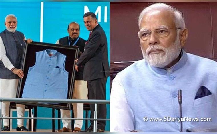 Narendra Modi wears jacket made of material recycled from plastic bottles