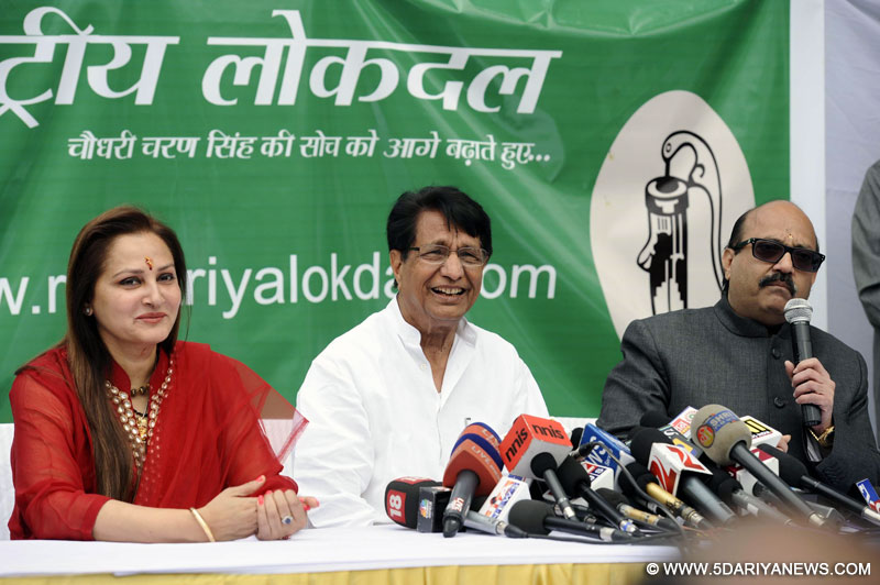 Actress turned politician Jaya Prada and Amar Singh with RLD (Rashtriya Lok Dal) chief Ajit Singh during a press conference after joining RLD in New Delhi   on March 10, 2014.