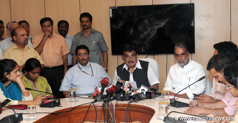 Nitin Jairam Gadkari briefing the media, in New Delhi on June 05, 2014. The Minister of State for Road Transport & Highways and Shipping, Krishan Pal and other dignitaries are also seen.