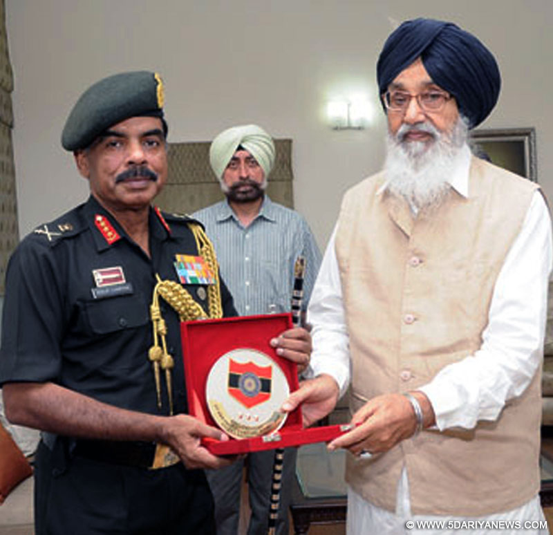 Punjab Chief Minister Parkash Singh Badal during a meeting with General Officer Commanding (GOC) Western Command Lieutenant General Phillip Compose in Chandigarh on July 30, 2014. 