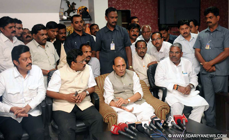 The Union Home Minister,  Rajnath Singh briefing the media after visiting the landslide site, in Maalin village, at Pune, Maharashtra on July 31, 2014.