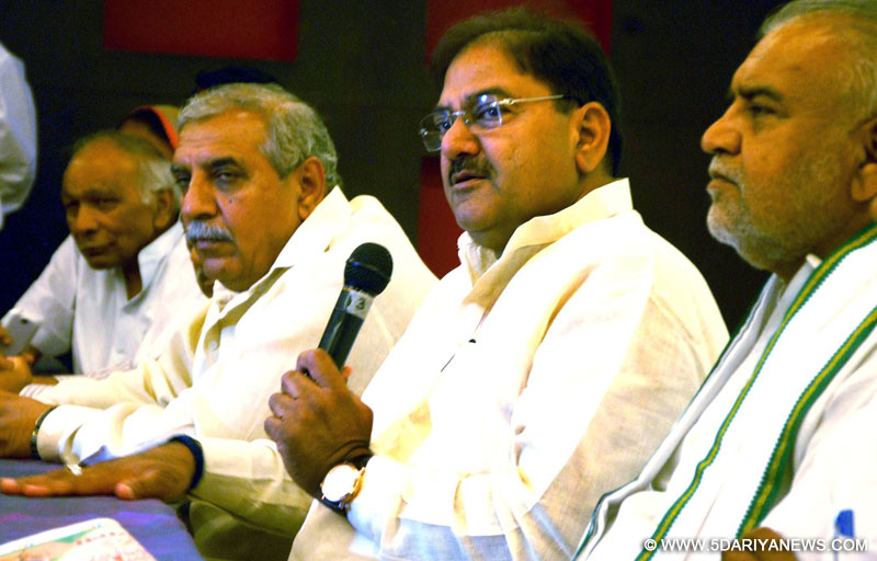 INLD leader Abhay Chautala and others announce list of candidates contesting upcoming Haryana assembly polls in Gurgaon on Aug 21, 2014. 