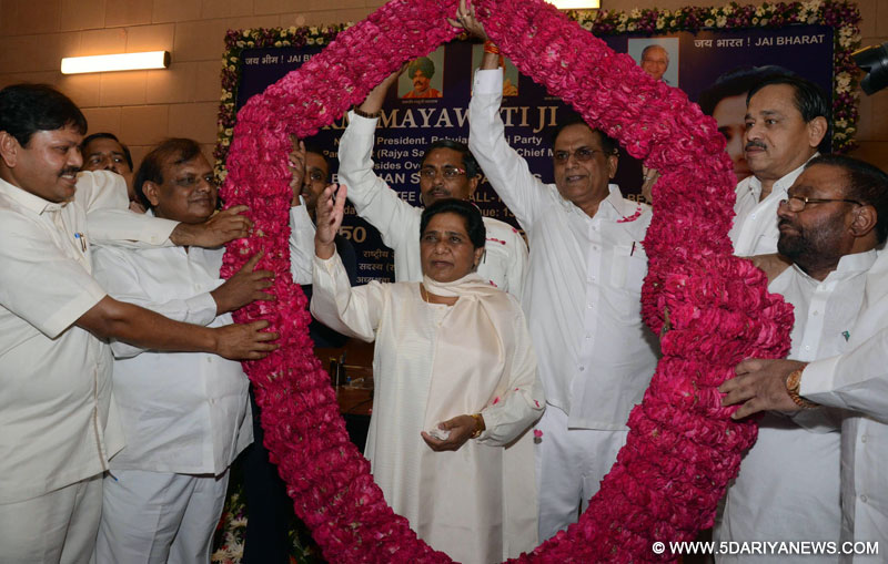 BSP chief Mayawati with party workers during a programme in Lucknow on Aug. 30, 2014. 