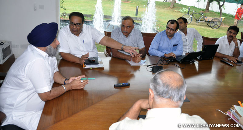 Punjab Deputy Chief Minister Mr. Sukhbir Singh Badal reviewing the ongoing e-governance and e-districts projects during a meeting at Chandigarh on 4-9-2014.