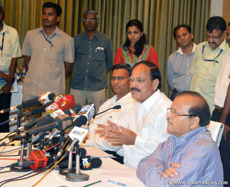 M. Venkaiah Naidu briefing the media after the review of Chennai Metro Rail Project and CPWD, in Chennai on September 05, 2014. The Secretary, Ministry of Urban Development, Shankar Agarwal and the Managing Director, CMRL, Pankaj Kumar Bansal are also seen.