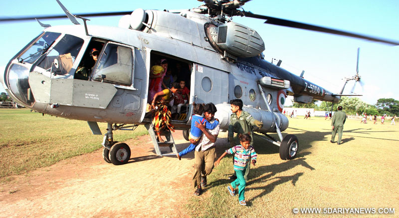 The Indian Air Force Helicopters carrying out rescue, relief and evacuation of people marooned during the flood fury, in Jammu and Kashmir on September 07, 2014.