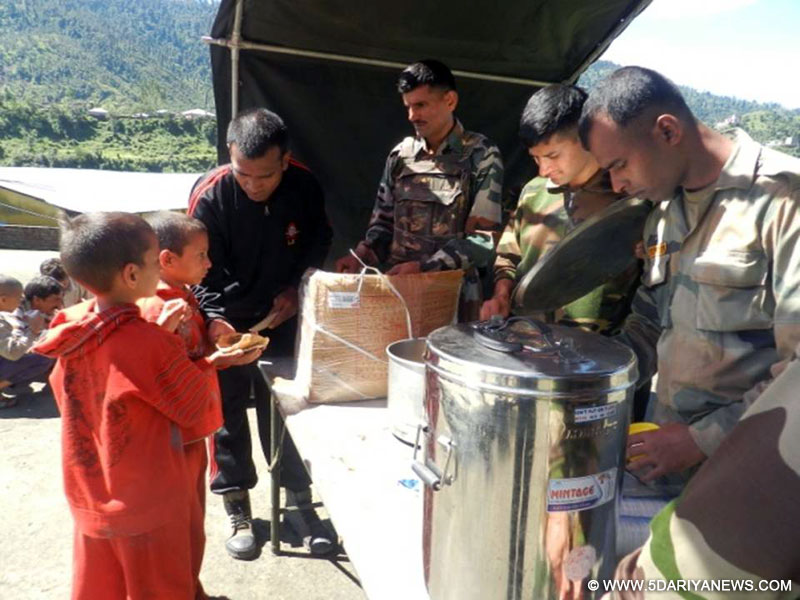 Army personnel helping flood-hit people in Jammu and Kashmir.