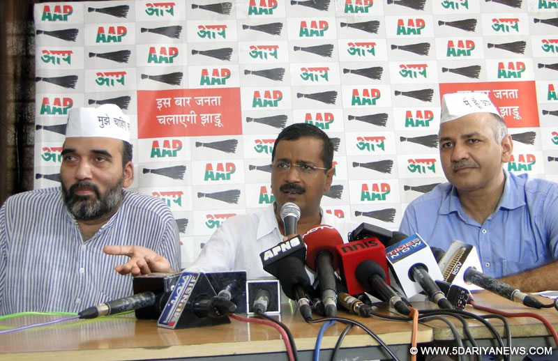 Aam Aadmi Party (AAP) leaders Gopal Rai, Arvind Kejriwal and Manish Sisodia during a press conference at Kaushambi on Sept 9, 2014. 