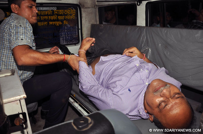 Former IPS officer and ex-Director General of Police, Rajat Majumdar being taken to hospital in Kolkata on Sept 9, 2014. He was arrested by the CBI in connection with the multi-crore-rupee Saradha chit fund scam. 
