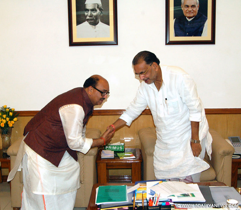 Narendra Singh calls on the Union Minister for Agriculture, Radha Mohan Singh, in New Delhi on September 09, 2014.