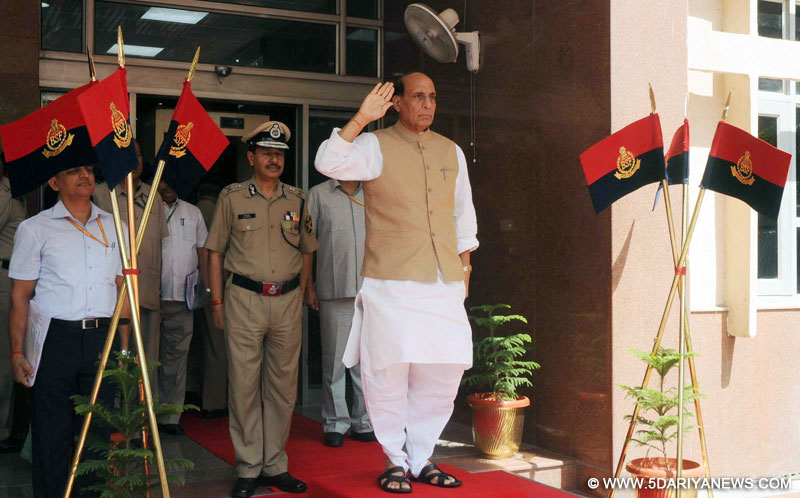 Rajnath Singh taking salute, during his visit, at the BSF Headquarter, in New Delhi on September 22, 2014. 