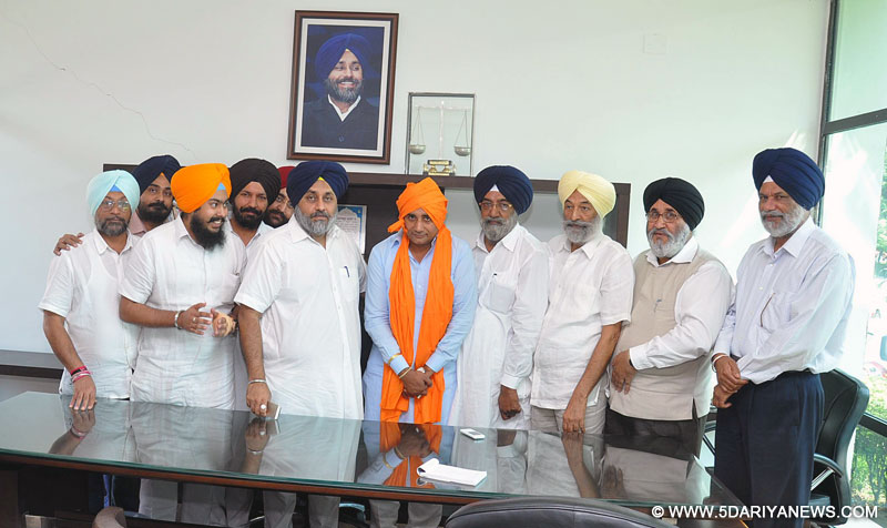 SAD President and Deputy Chief Minister Punjab Sukhbir Singh Badal along with Senior Party leaders honoring  Balwinder Singh punia SAD candidate from Ambala City at party Head office, Chandigarh on Friday 26-09-2014.