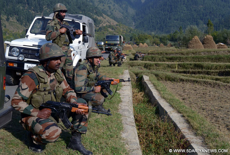 Soldiers in action during an encounter in Kupwara of Jammu and Kashmir on Sept. 30, 2014. One alleged militant was killed in the encounter