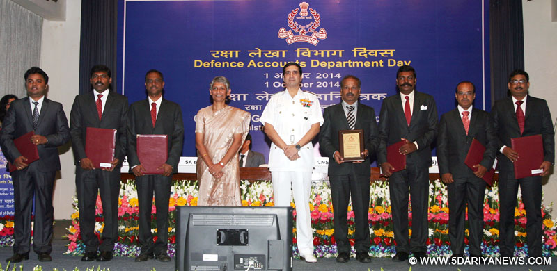 R.K. Dhowan and the Controller General of Defence Accounts, Ms. Vandana Srivastava in a group photo with the award winners, during the Defence Accounts Department Day Celebrations, in New Delhi 