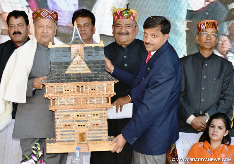Virbhadra Singh being honoured by Kullu Dussehra Festival Committee at Kullu on 9 October 2014