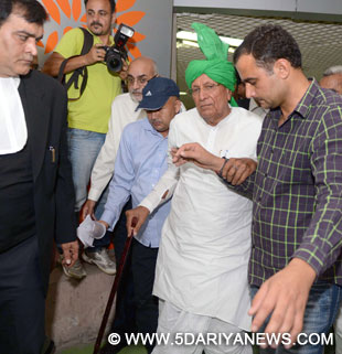 Indian National Lok Dal chief Om Prakash Chautala arrives to appear before Delhi High Court in New Delhi, on Oct.10, 2014. Chautala who was also the former Haryana chief minister was directed by the court to surrender to Tihar Jail authorities on Saturday (11th October 2014). 