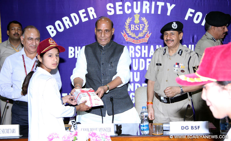 Rajnath Singh with the children from Jammu Region (J&K) on a Bharat Darshan tour, organised by the BSF under the National Integration Plan, in New Delhi 