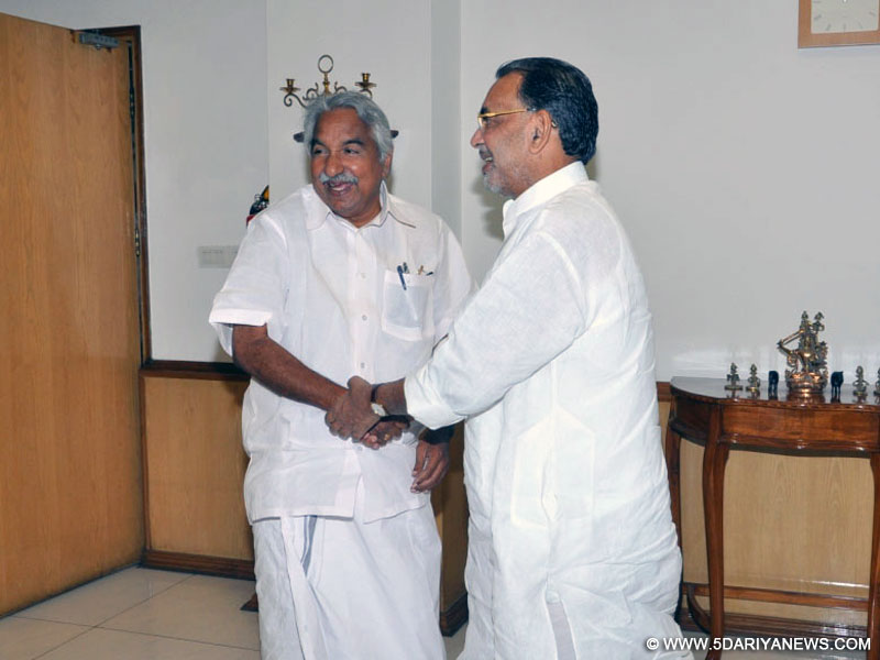  Oommen Chandy calls on the Union Minister for Agriculture, Radha Mohan Singh, in New Delhi on October 16, 2014