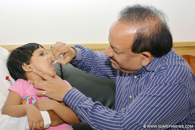 Dr. Harsh Vardhan administering the polio vaccine drops to children under-five years to mark the World Polio Day, in New Delhi on October 24, 2014. 