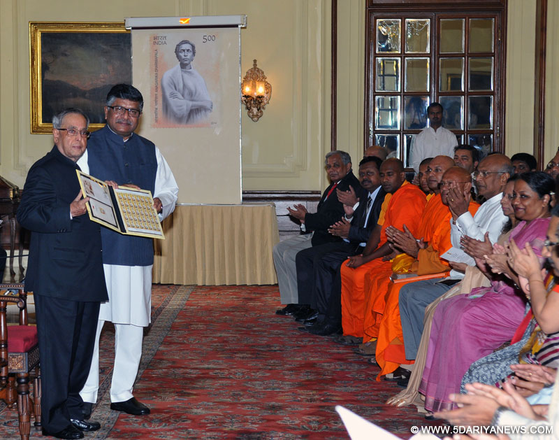 Pranab Mukherjee releasing a Commemorative Postage Stamp on Anagarika Dharmapala, at Rashtrapati Bhavan, in New Delhi on October 25, 2014. 
